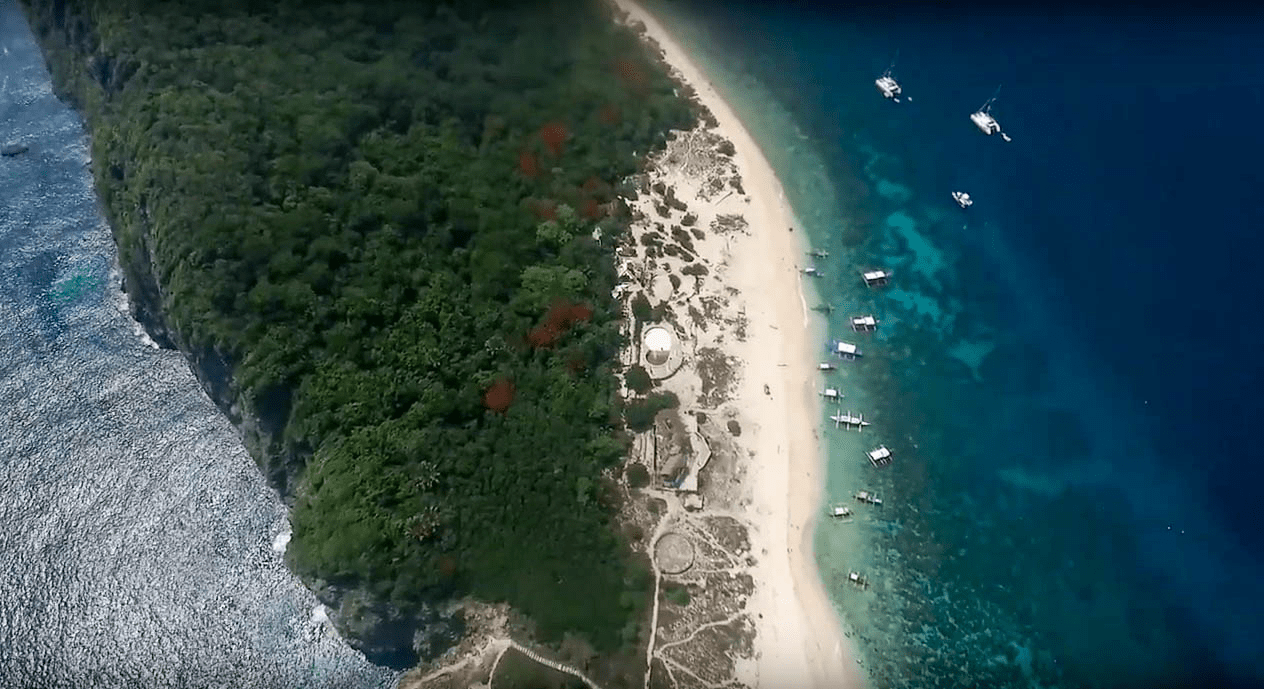 fortune island in nasugbu batangas as seen high from the sky shot by drone in philippines